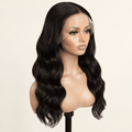 Illustrative studio image of a natural black body wave wig on a mannequin