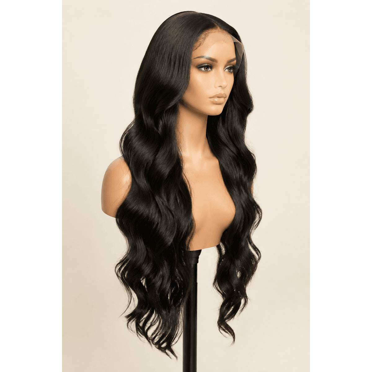 Illustrative studio image of a long natural black body wave wig on a mannequin